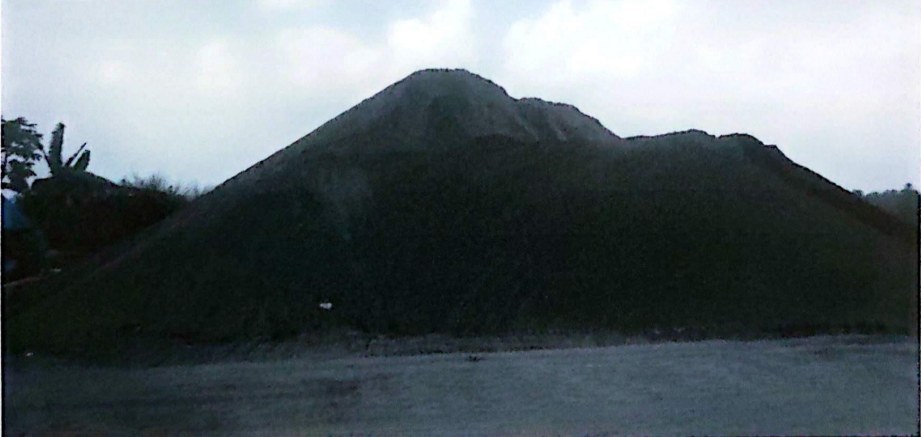 Aggregate stockpiles — historical photograph from the company profile